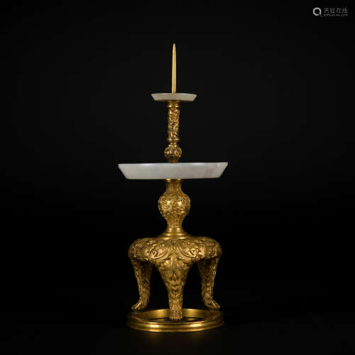 A gilt-bronze candlestick