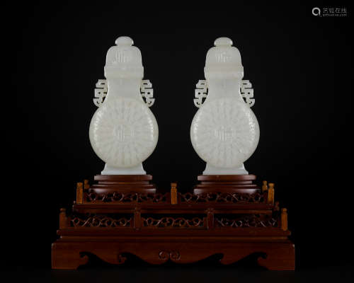 A pair of jade 'poems' vase and cover