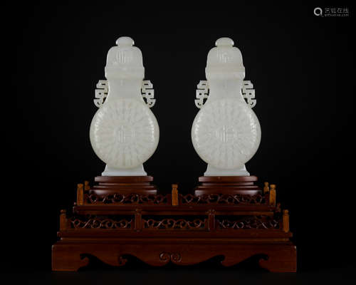 A pair of jade 'poems' vase and cover