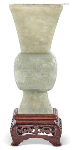 A Chinese Carved Celadon Jade Gu Vase