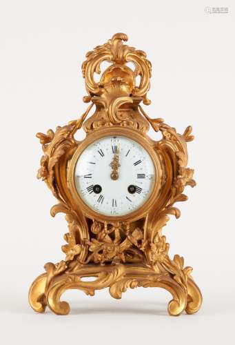 Horlogerie: Petite pendule à poser en bronze doré, cadran ém...