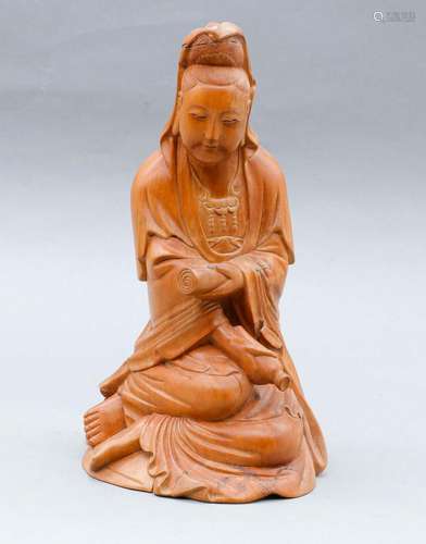 Statuette de Guanyin assise en bois dur, probablement huangy...