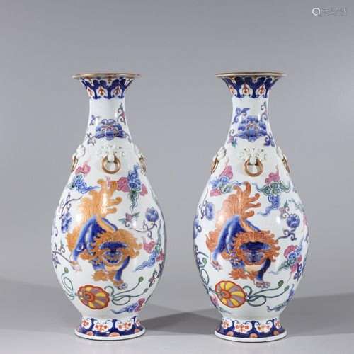 Pair of Chinese Famille Rose Enameled Gilt Porcelain Foo Lio...