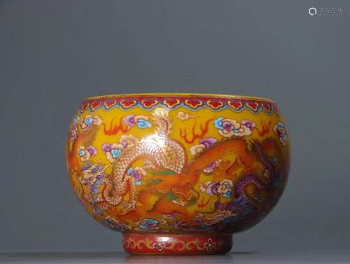A Glass Bowl With Dragon Pattern