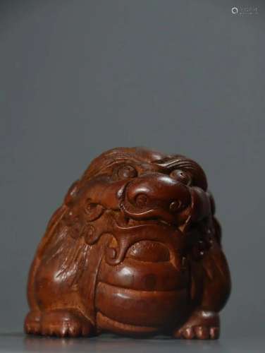 A Old Bamboo Carved 'Lion' Ornament