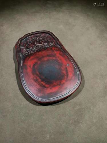 A Delicate Cinnabar Inkstone By He Ying