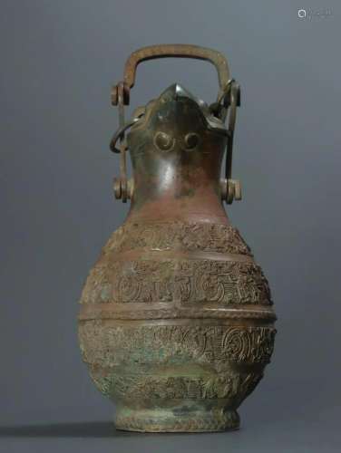 A Bronze Lifting Beam Pot With Bird Pattern