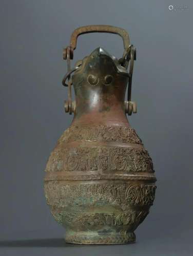 A Bronze Lifting Beam Pot With Bird Pattern