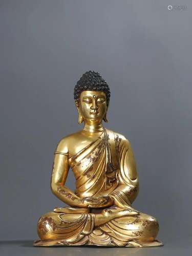 A Gilt-bronze Figure of Buddha