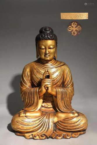 A Gilt bronze Seated Statue of Sakyamuni