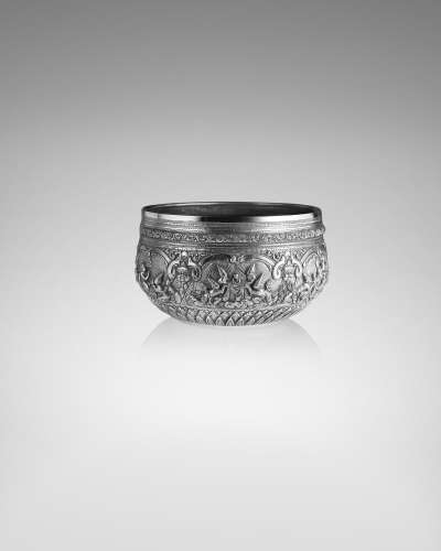 A SILVER OFFERING BOWL WITH SCENES OF BUDDHA'S NATIVITY ...