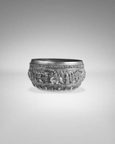 A SILVER OFFERING BOWL WITH SCENES FROM THE CULLAHAMSA JATAK...