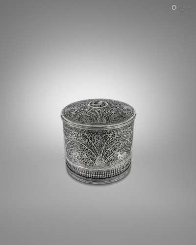 A SILVER BETEL BOX DECORATED WITH FAUNA IN A BAMBOO FOREST S...