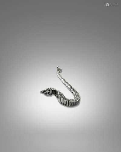 A SILVER NAGA ORNAMENT NORTHERN BURMA (MYANMAR), EARLY 20TH ...