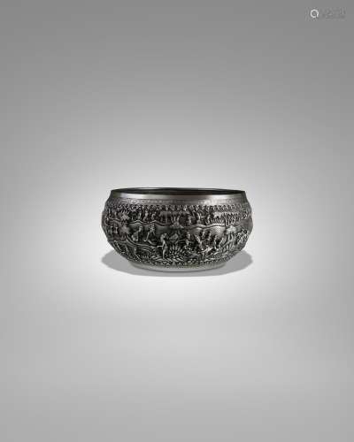 A SILVER OFFERING BOWL WITH SCENES FROM THE SAMA JATAKA LOWE...