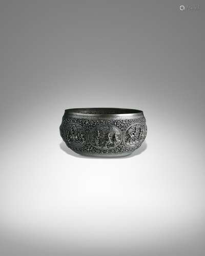 A SILVER OFFERING BOWL WITH SCENES FROM THE SAMA JATAKA LOWE...