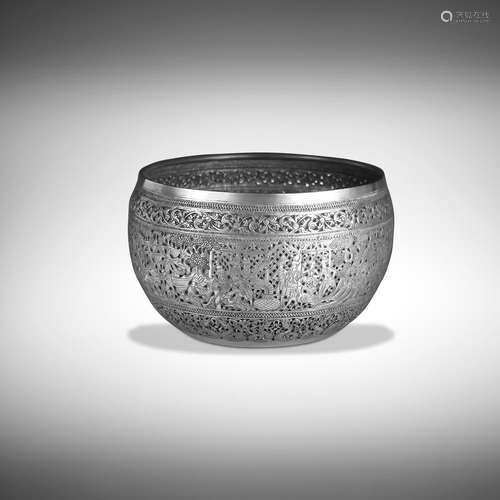 A SILVER OFFERING BOWL WITH SCENES FROM THE BHURIDATTA JATAK...