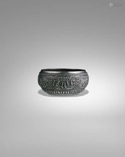 A SILVER OFFERING BOWL WITH SCENES OF A LOCAL BURMESE LEGEND...