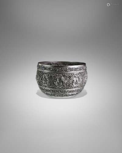 A SILVER OFFERING BOWL WITH SCENES FROM THE SAMA JATAKA LOWE...