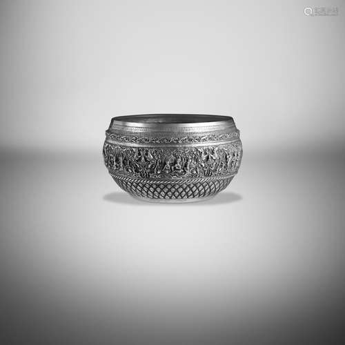 A SILVER OFFERING BOWL WITH SCENES FROM THE SAMA JATAKA LOWE...