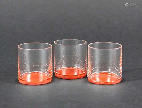 Pierre LEGRAIN (1888 – 1929) Suite de trois verres à orangea...