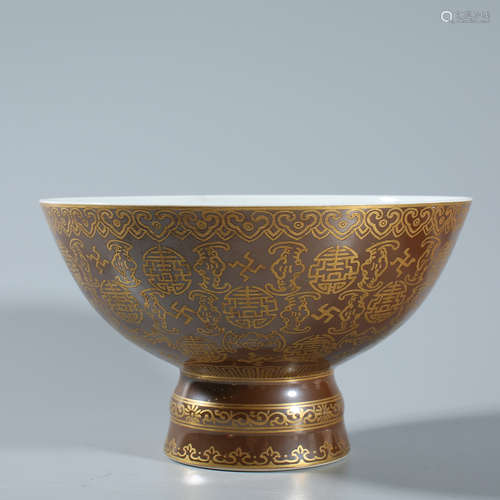 Gold colored high foot bowl