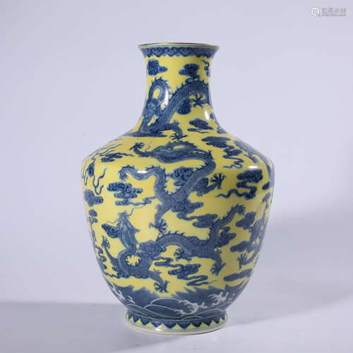 Blue and white bottle with yellow background