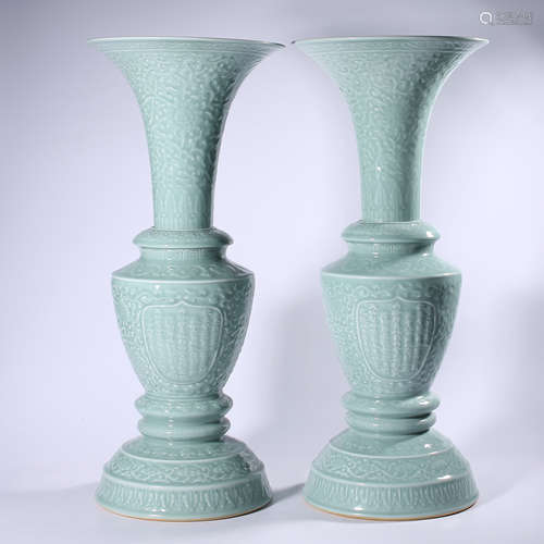 A pair of green glazed flower Goblets