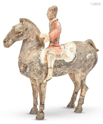 A Chinese Pottery Horse and Rider