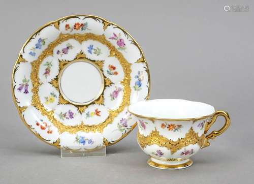 A ceremonial demitasse with a saucer,