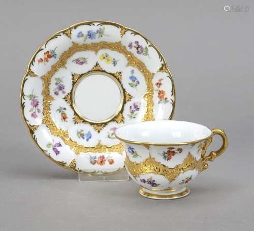 A ceremonial demitasse with a saucer,