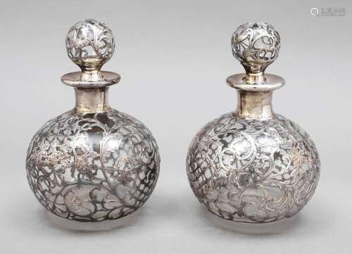 Pair of carafes with silver ov