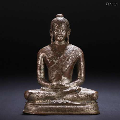 A Chinese Bronze Seated Medicine Buddha