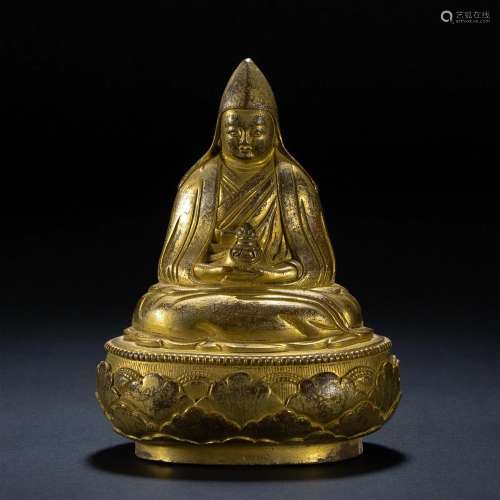 A Tibetan Bronze-gilt Seated Master Gu