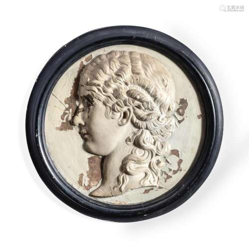 A PAINTED PLASTER ROUNDEL WITH CLASSICAL FEMALE PROFILE RELI...