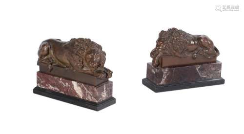 AFTER ANTONIO CANOVA, A PAIR OF BRONZE MODELS OF RECLINING L...