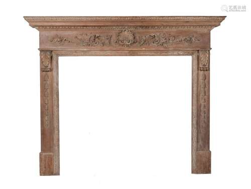 A GEORGE III STRIPPED AND CARVED PINE CHIMNEY PIECE IN NEO-C...