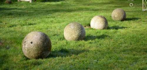 A SET OF FOUR CORNISH GRANITE BALLS, 20TH CENTURY