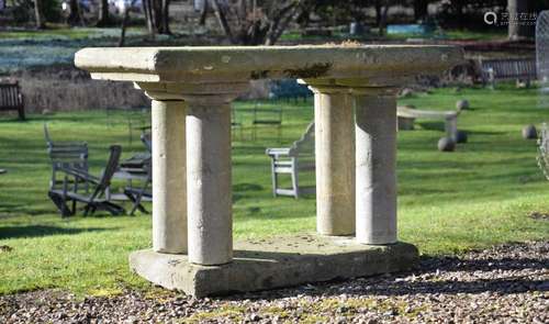 A LIMESTONE COLUMNAR GARDEN TABLE, 20TH CENTURY