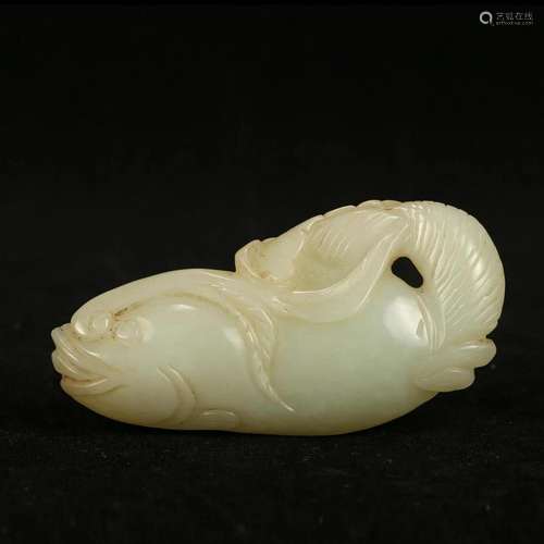 A WHITE JADE 'FISH' PENDANT