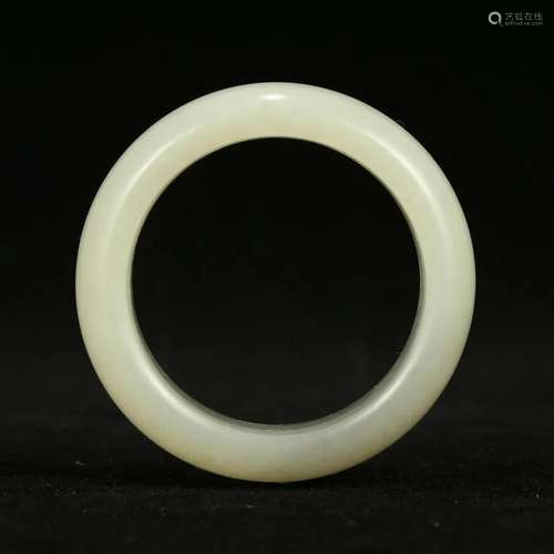 A WHITE JADE BRACELET