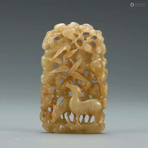 A WHITE JADE CARVED PENDANT