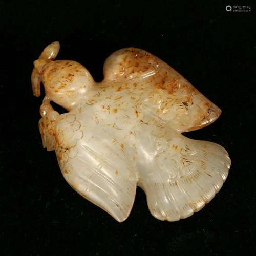 A WHITE JADE 'BIRD' PENDANT