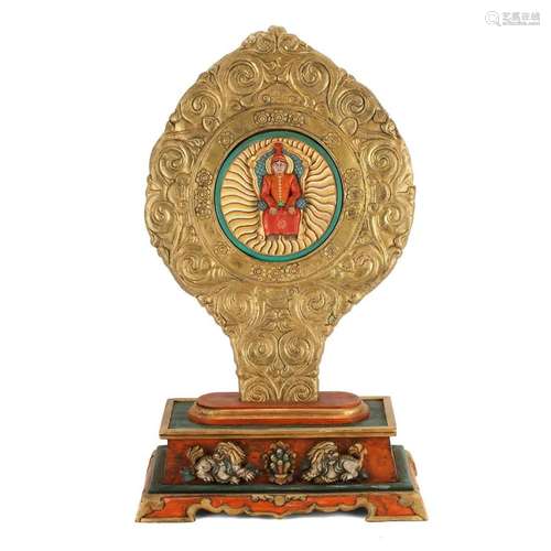 A BUDDHA PLAQUE ON STAND, TIBET