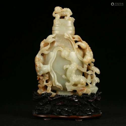 A WHITE JADE 'CHILONG' VASE