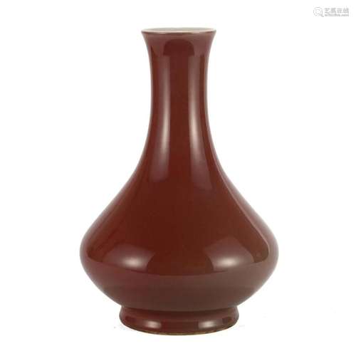 A RED-GLAZED VASE