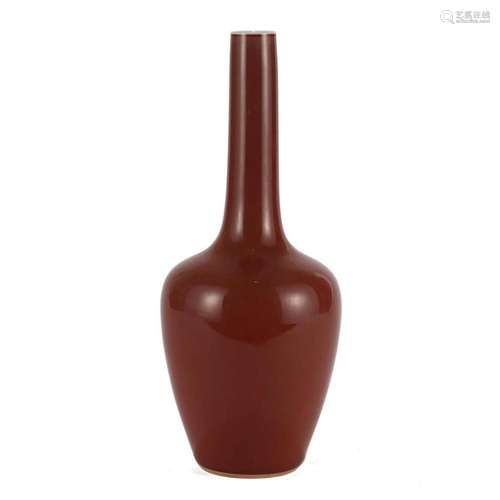 A RED-GLAZED VASE