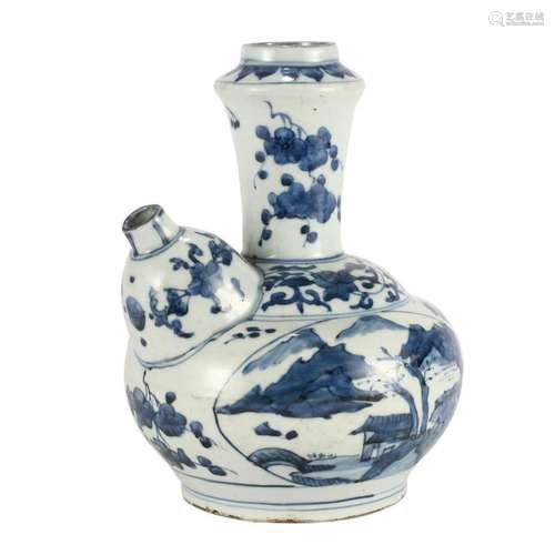 A BLUE AND WHITE FLORAL EWER