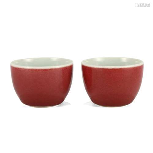 A PAIR OF RED-GLAZED CUPS