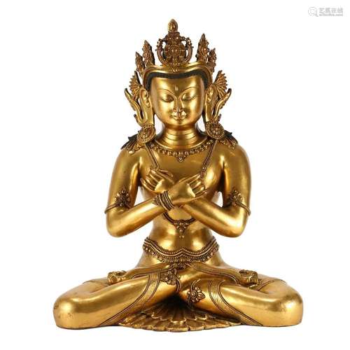 A GILT-BRONZE FIGURE OF SEATED BODHISATTVA